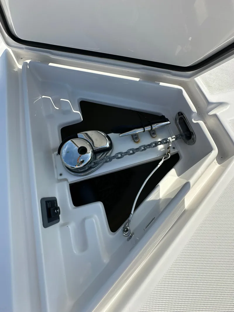 Slide: The Image of Anchor compartment of 2019 Jupiter 30 HFS boat with chain and winch. - 47