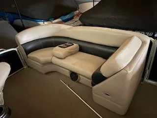 Slide: The Image of 2012 Premier 250 Grand Majestic LTD boat seating, beige and black upholstery, indoor storage. - 3