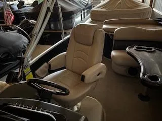 Slide: The Image of Luxurious interior of 2012 Premier 250 Grand Majestic LTD pontoon boat with plush seating. - 6