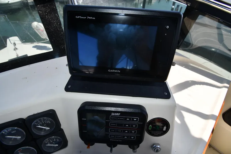 Slide: The Image of 1988 Tollycraft 34 Sundeck helm with Garmin GPSmap 741xs and instrument panel. - 16