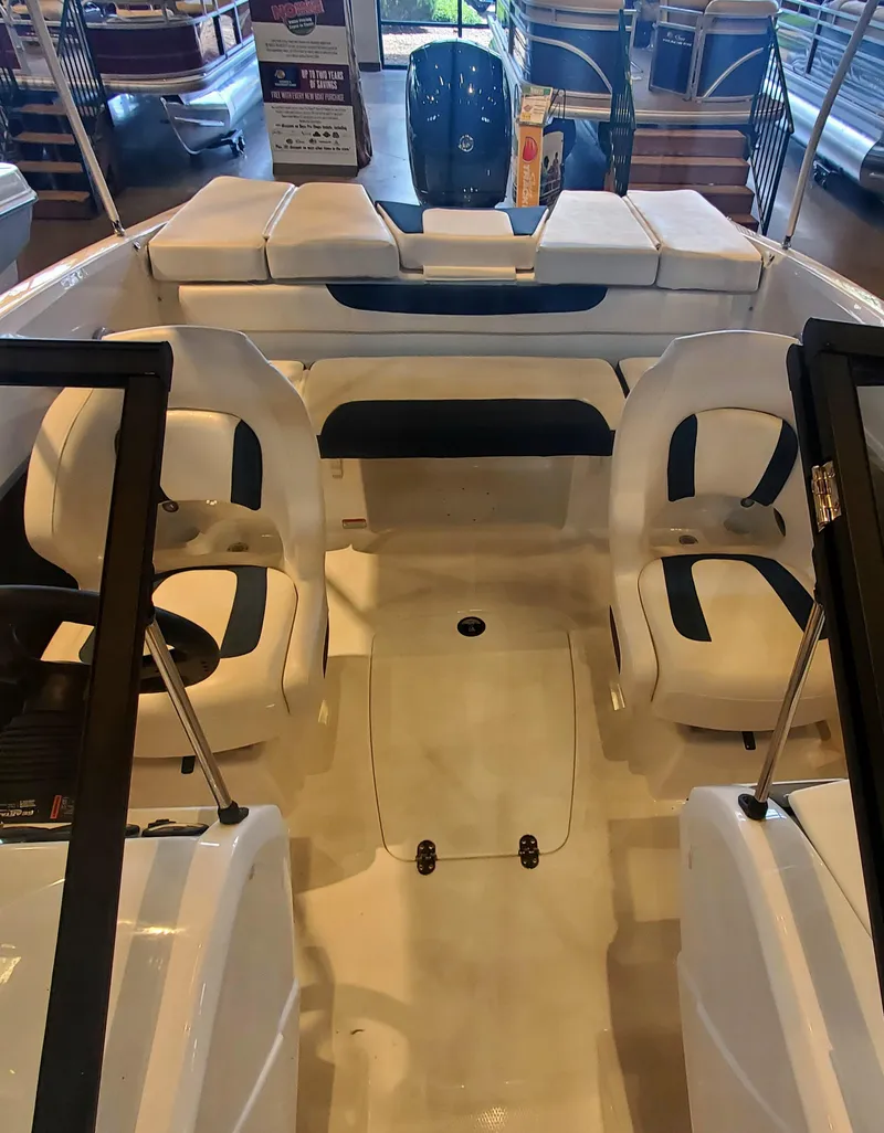 Slide: The Image of 2024 Tahoe 185 S boat interior with seating and storage compartments. - 5