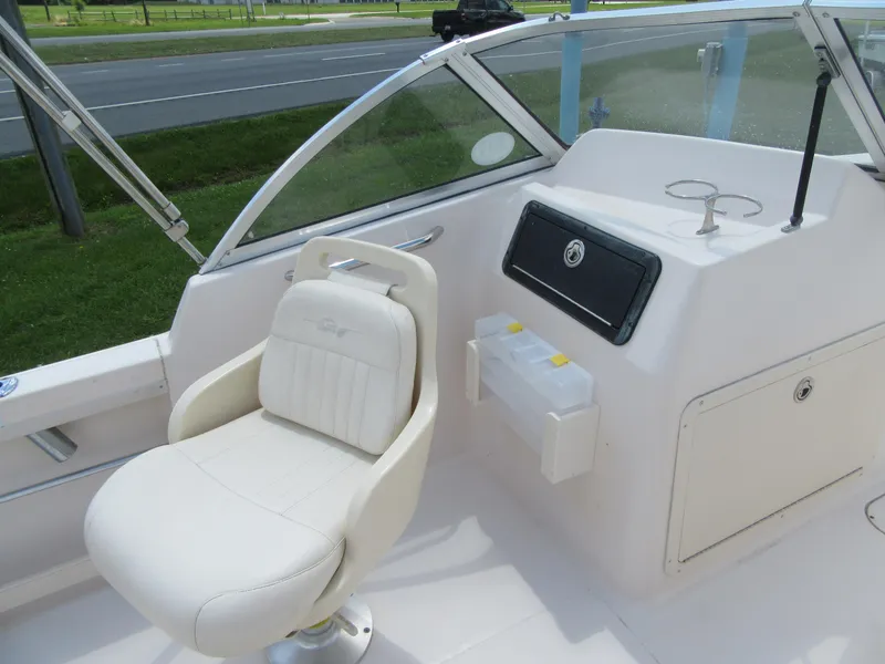 Slide: The Image of 2009 Grady-White Tournament 185 boat interior with captain's chair and console. - 15