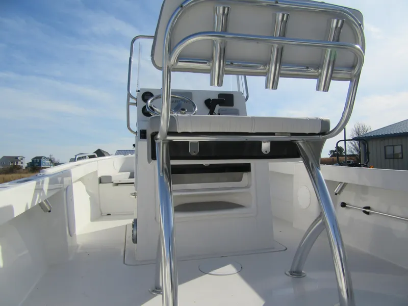 Slide: The Image of 2024 Parker 18SE Center Console boat interior with steering console and seating. - 12