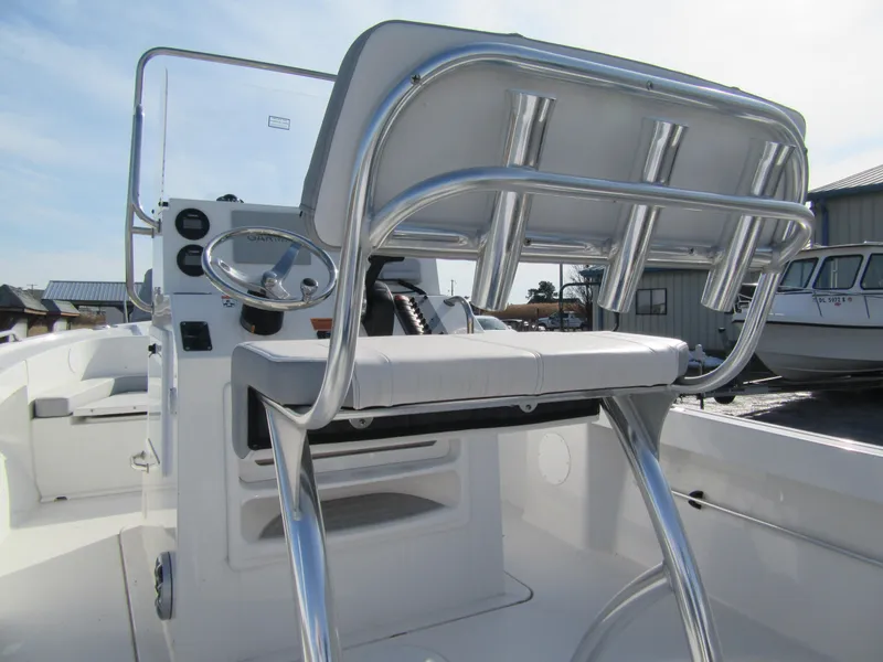 Slide: The Image of 2024 Parker 18SE Center Console boat interior with steering wheel and seating. - 4