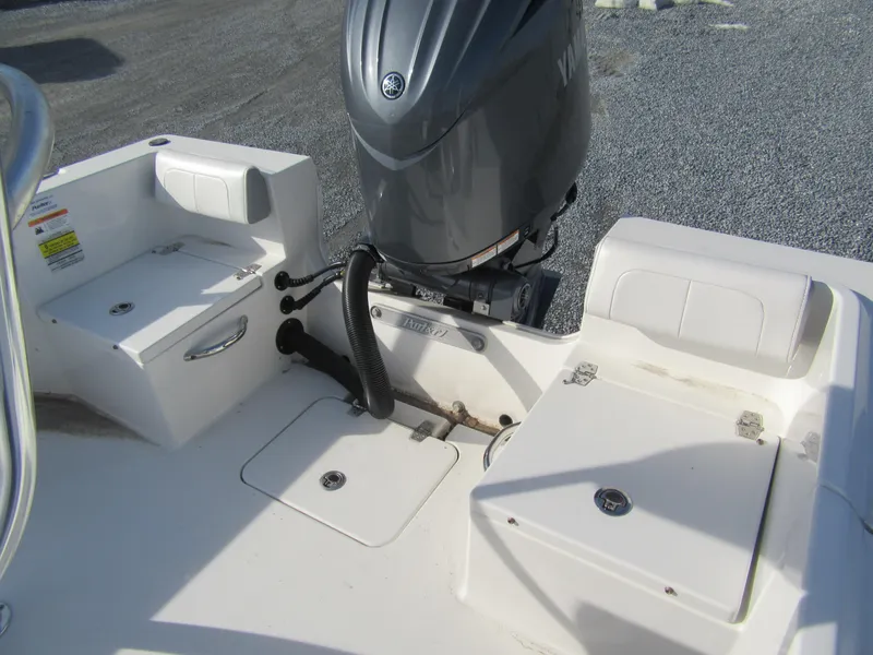 Slide: The Image of 2024 Parker 18SE Center Console boat with Yamaha outboard motor. - 5