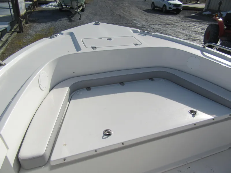 Slide: The Image of 2024 Parker 18SE Center Console boat interior with seating and storage compartments. - 9