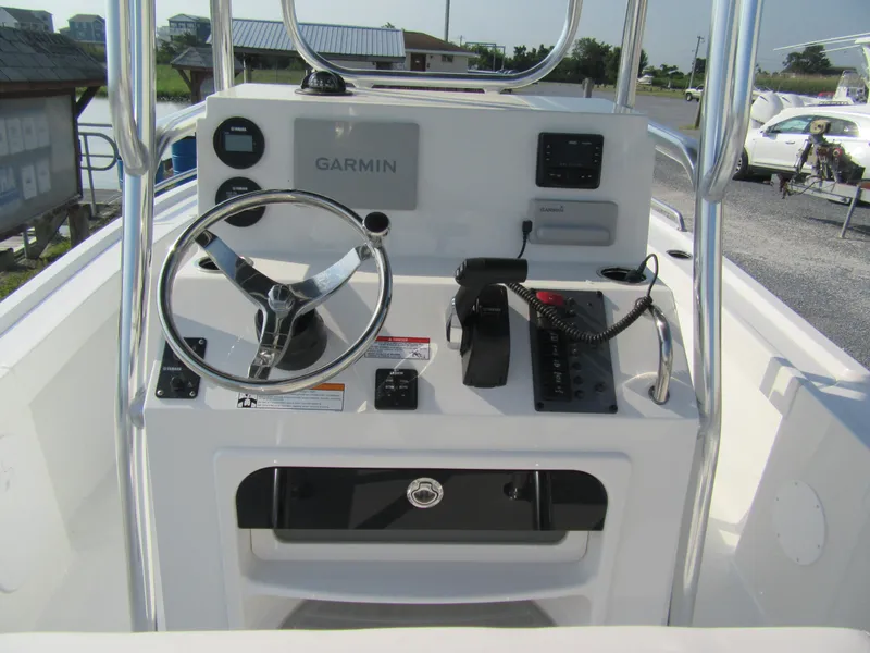 Slide: The Image of 2024 Parker 18SE Center Console boat dashboard with Garmin navigation system. - 4