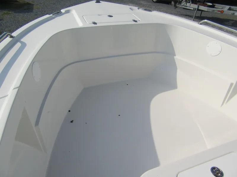 Slide: The Image of 2024 Parker 18SE Center Console boat interior, spacious and clean white deck. - 7