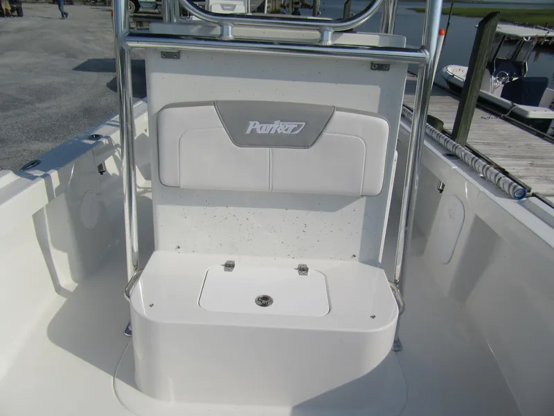 Slide: The Image of 2024 Parker 18SE Center Console boat interior with seating and storage. - 8
