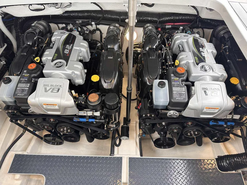 Slide: The Image of Twin V8 engines in a 2025 Formula 350 Crossover Bowrider I/O boat. - 11
