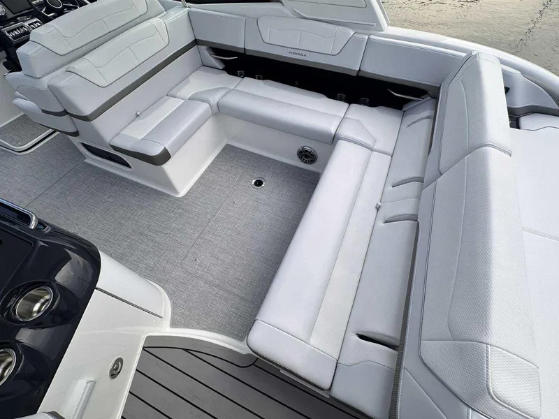 Slide: The Image of 2025 Formula 350 Crossover Bowrider I/O with spacious white seating and sleek design. - 14