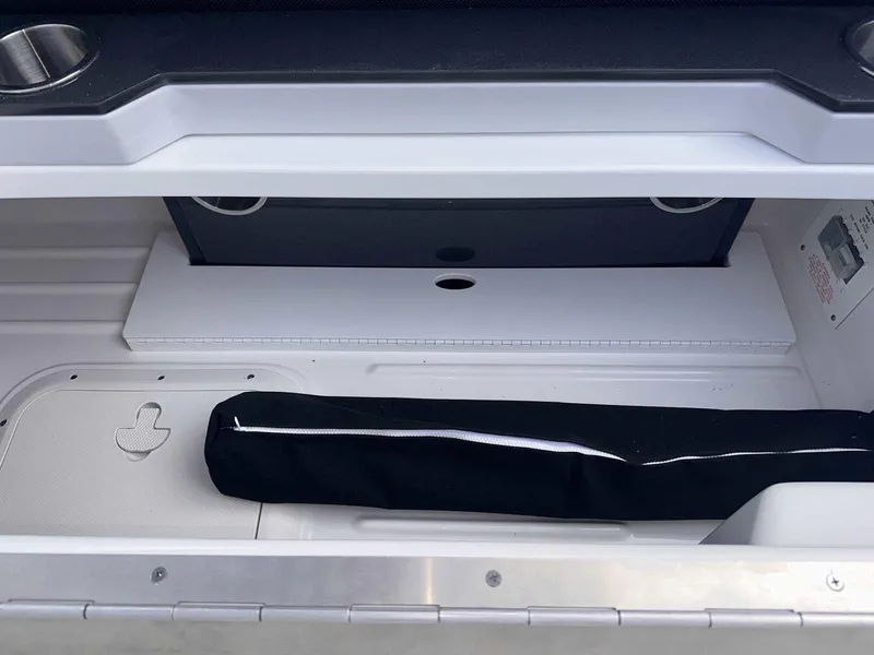 Slide: The Image of Storage compartment of 2025 Formula 350 Crossover Bowrider I/O boat. - 16
