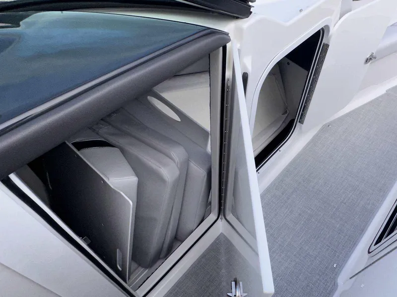 Slide: The Image of 2025 Formula 350 Crossover Bowrider I/O storage compartments with sleek design. - 29