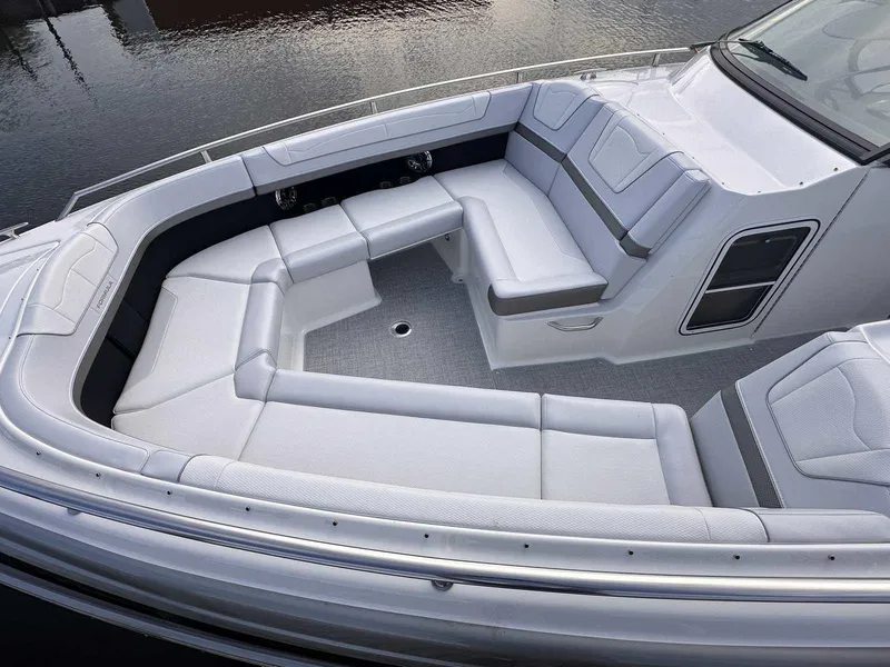 Slide: The Image of 2025 Formula 350 Crossover Bowrider I/O with spacious white seating area. - 33