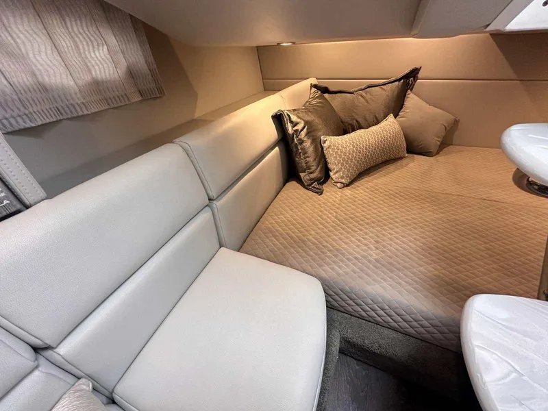 Slide: The Image of Luxurious interior of 2025 Formula 350 Crossover Bowrider I/O with plush seating and cushions. - 42