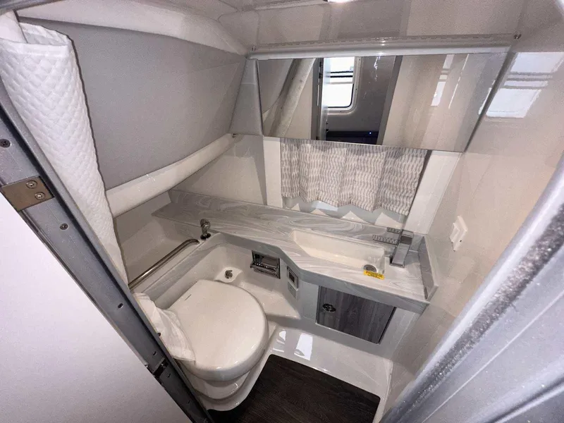 Slide: The Image of 2025 Formula 350 Crossover Bowrider I/O bathroom interior with modern fixtures and sleek design. - 46