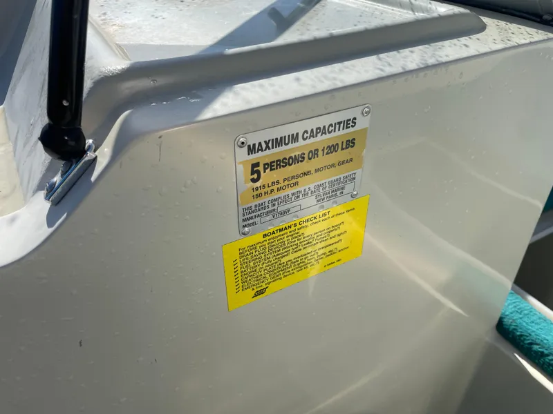 Slide: The Image of Battery compartment of a 1996 Sylvan VIPER boat with Interstate battery. - 7