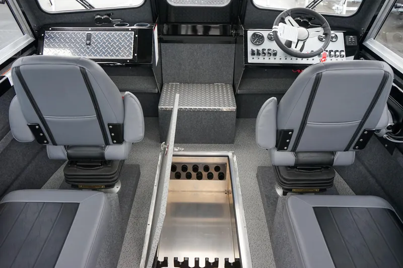 Slide: The Image of 2024 Thunder Jet 21 Chinook Pro boat interior with dual seats and control panel. - 10
