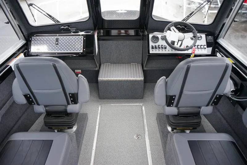 Slide: The Image of 2024 Thunder Jet 21 Chinook Pro boat interior with dual seats and modern dashboard. - 9
