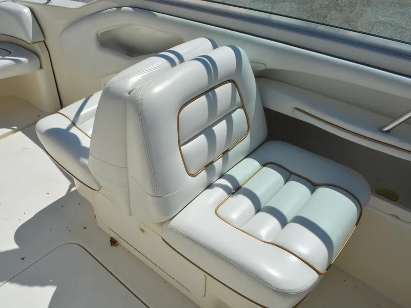 Slide: The Image of 1997 Sea Ray 280 Cuddy Cabin boat interior seating. - 14