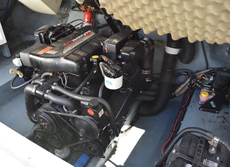 Slide: The Image of Engine compartment of a 1997 Sea Ray 280 Cuddy Cabin boat. - 16