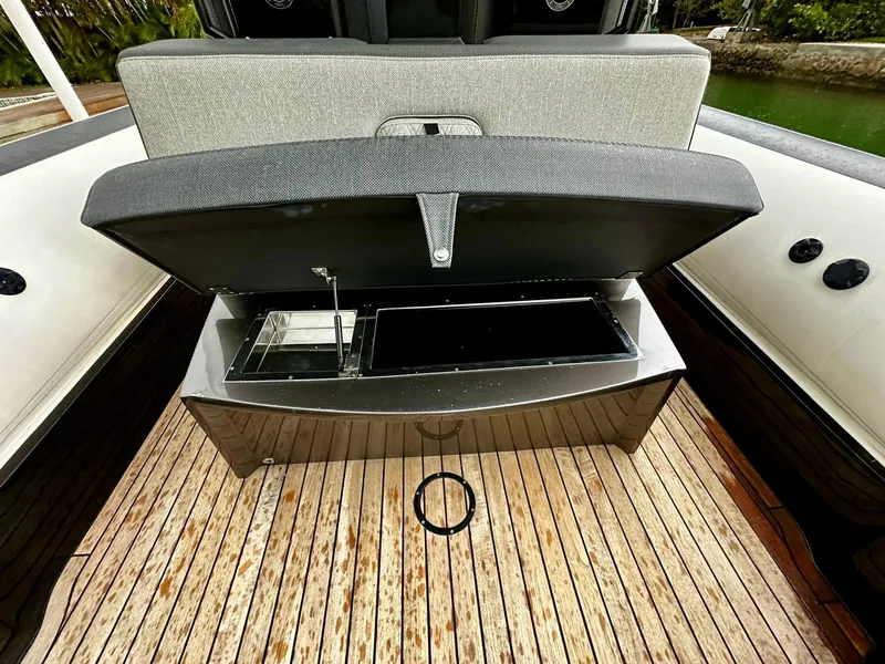 Slide: The Image of 2020 Technohull seaDNA 999 boat with open storage compartment and sink. - 25