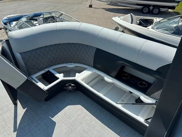 Slide: The Image of 2024 Vanderbilt 700 T boat interior with seating and storage compartments. - 10