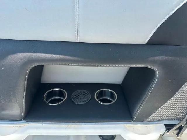 Slide: The Image of 2024 Vanderbilt 700 T rear seat cup holders and speaker. - 11