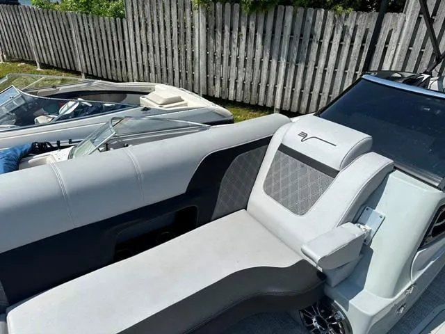 Slide: The Image of 2024 Vanderbilt 700 T boat with luxurious seating and modern design. - 14