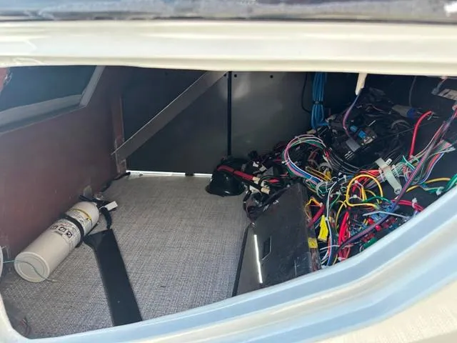 Slide: The Image of 2024 Vanderbilt 700 T trunk with wiring and fire extinguisher - 17