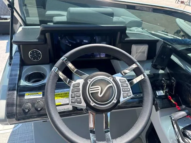 Slide: The Image of Steering wheel and dashboard of 2024 Vanderbilt 700 T boat. - 18