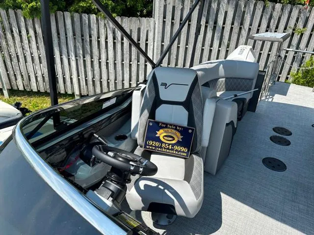 Slide: The Image of 2024 Vanderbilt 700 T boat for sale, interior view with steering wheel and seating. - 21