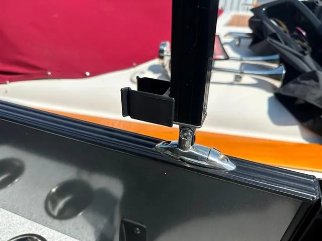 Slide: The Image of Close-up of a 2024 Vanderbilt 700 T boat's windshield mount. - 26