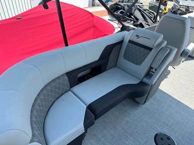 Slide: The Image of 2024 Vanderbilt 700 T boat interior with gray and black seating. - 27