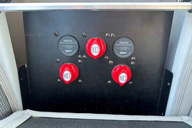 Slide: The Image of Control panel of a 2024 Vanderbilt 700 T with red switches and digital voltage meters. - 34