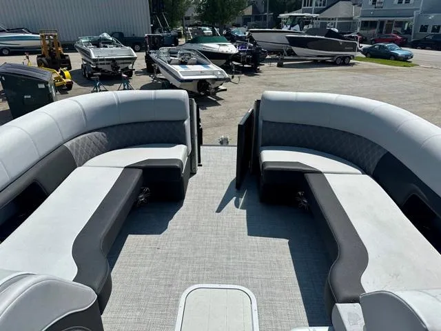 Slide: The Image of 2024 Vanderbilt 700 T boat interior with spacious seating and modern design. - 9