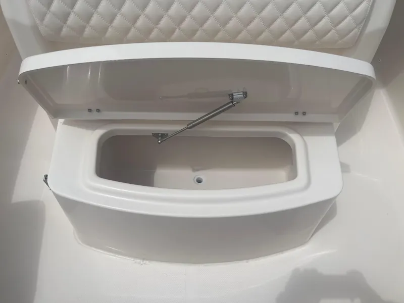 Slide: The Image of Open storage compartment in 2025 Grady-White Canyon 271 boat. - 10