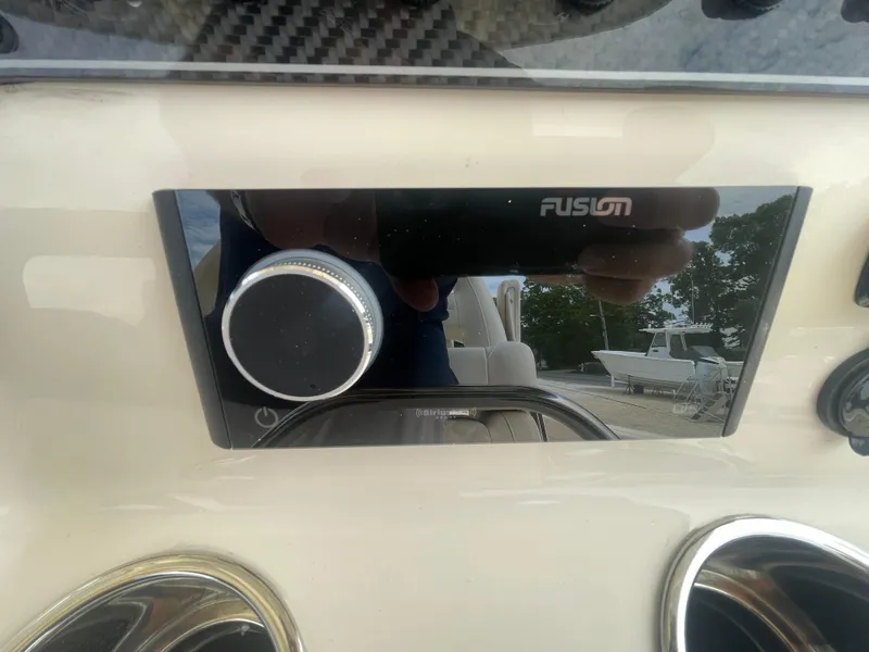 Slide: The Image of Fusion audio system on 2025 Grady-White Canyon 271 boat dashboard. - 15