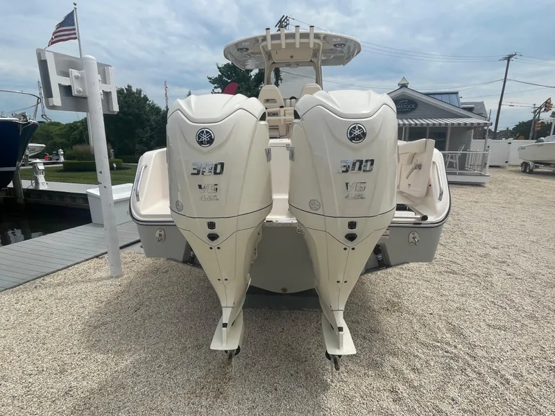 Slide: The Image of 2025 Grady-White Canyon 271 with twin Yamaha 300 outboard engines. - 27