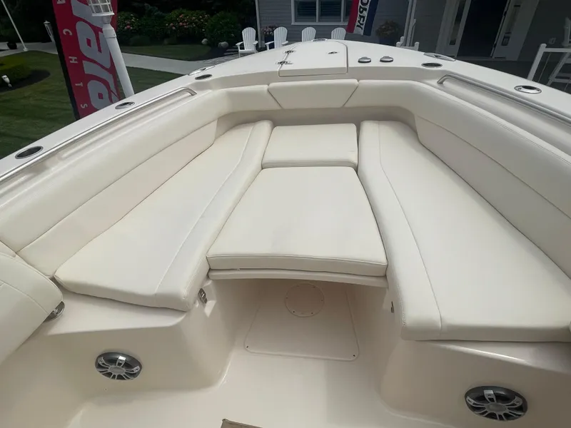 Slide: The Image of 2025 Grady-White Canyon 271 boat with spacious cushioned seating area. - 3