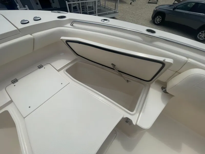 Slide: The Image of 2025 Grady-White Canyon 271 boat interior storage compartments. - 9