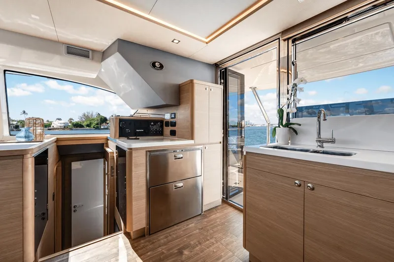 Slide: The Image of Modern kitchen interior of 2024 Aquila 44 Yacht with ocean view. - 10