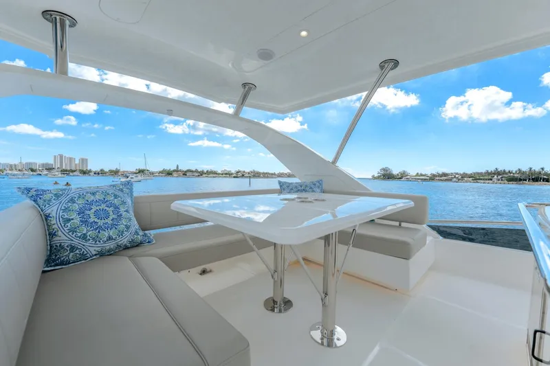 Slide: The Image of Luxurious seating area on the 2024 Aquila 44 Yacht with ocean view. - 31