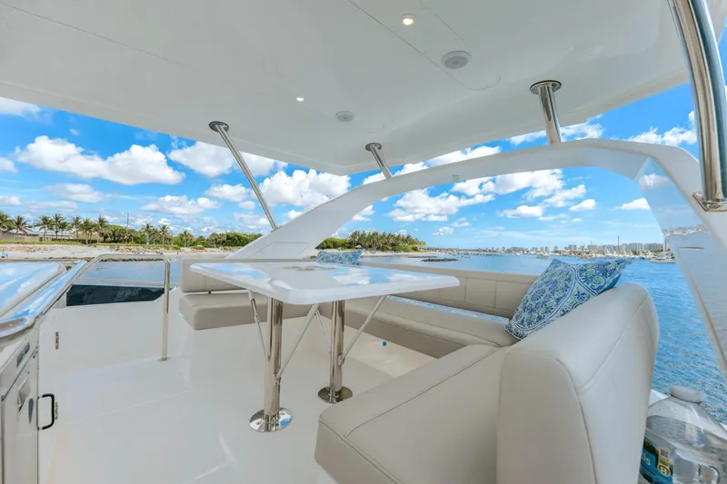 Slide: The Image of Luxurious seating area on the 2024 Aquila 44 Yacht with ocean view. - 49
