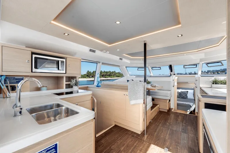 Slide: The Image of Modern interior of 2024 Aquila 44 Yacht with kitchen and dining area. - 8