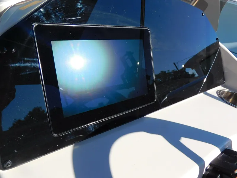 Slide: The Image of Touchscreen display on the dashboard of a 2024 Stingray 212 SC boat. - 10