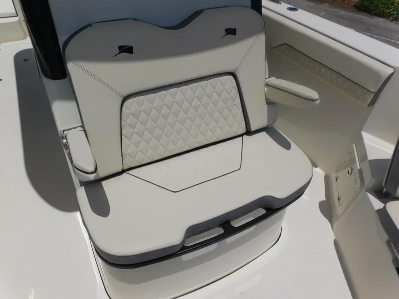 Slide: The Image of 2024 Stingray 253 CC boat seat with diamond-stitched upholstery. - 21