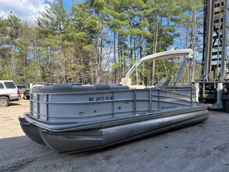 Slide: The Image of 2018 Berkshire 24RFX CTS pontoon boat in a wooded area. - 4