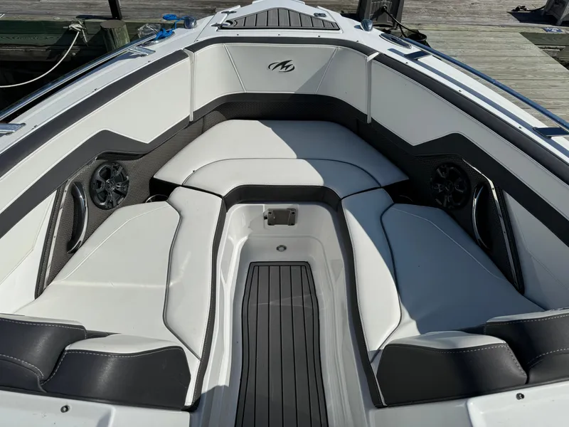 Slide: The Image of 2018 Monterey 258 Super Sport boat interior with white and black seating. - 19