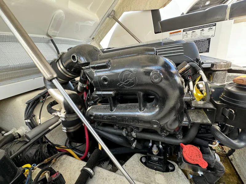 Slide: The Image of 2018 Monterey 258 Super Sport engine compartment with detailed view of the engine. - 25